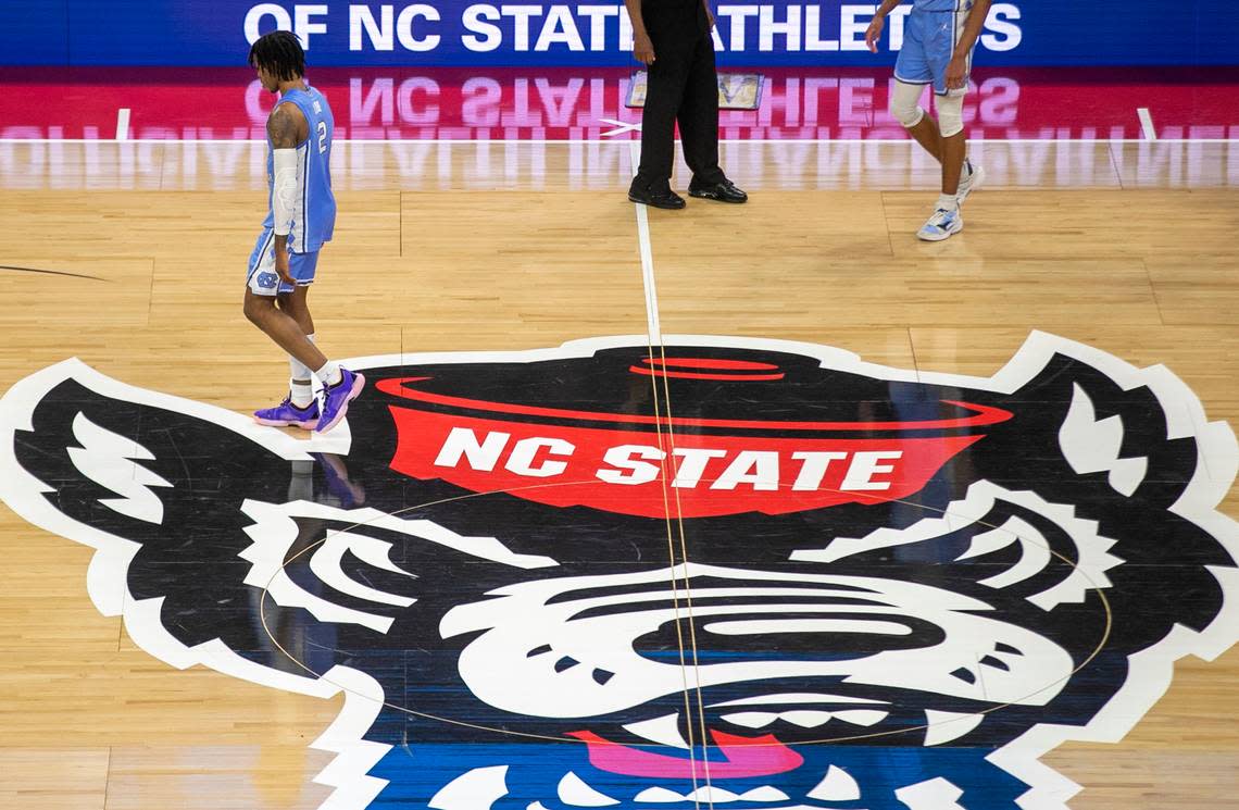 North Carolina’s Caleb Love (2) leaves the court following the Tar Heels’ 77-69 loss to N.C. State on Sunday, February 19, 2023 at PNC Arena in Raleigh, N.C.