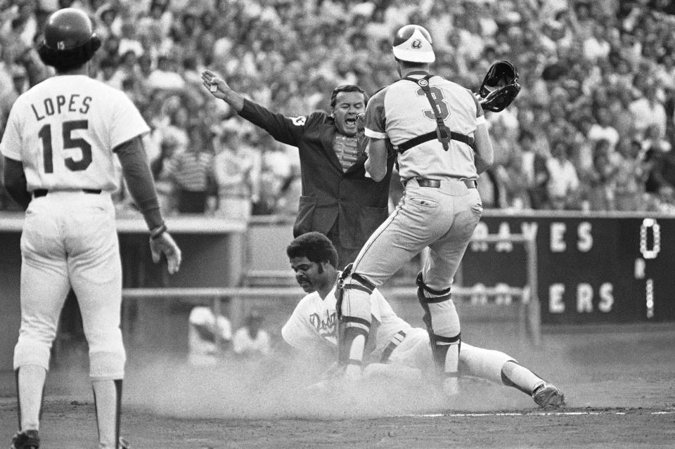 Dutch Rennert, a National League umpire with a distinctive, memorable strike call, died on Sunday at 88. (AP Photo/Mclendon, File)