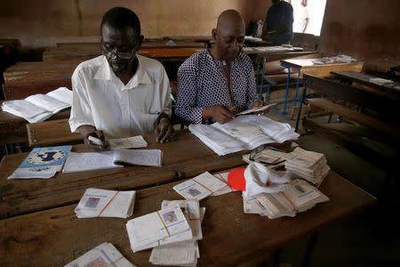 Pooling agents prepare to distribute electoral cards at a pooling station of Lafiabougou in Bamako, Mali July 23, 2018. REUTERS/Luc Gnago