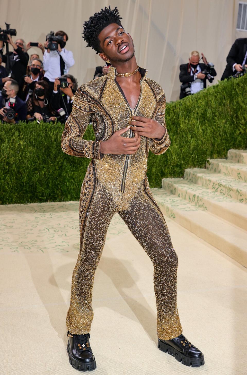 Lil Nas X attends The 2021 Met Gala Celebrating In America: A Lexicon Of Fashion at Metropolitan Museum of Art on September 13, 2021 in New York City