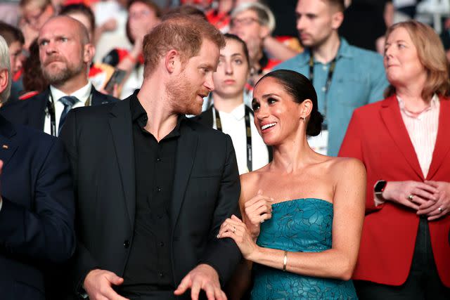 <p>Chris Jackson/Getty</p> Prince Harry and Meghan Markle attend the 2023 Invictus Games closing ceremony.