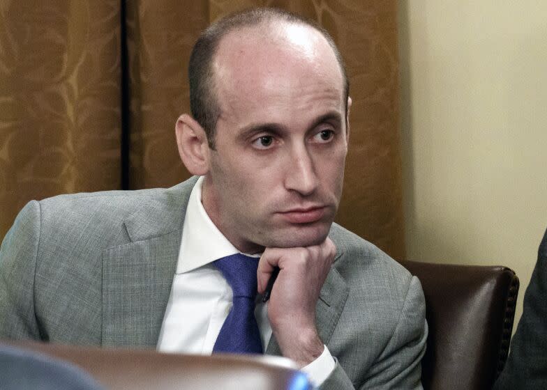 FILE - White House senior adviser Stephen Miller listens as President Donald Trump speaks during a cabinet meeting at the White House in Washington, June 21, 2018. Miller, who served as a top aide to President Donald Trump, will appear Thursday before the congressional committee investigating the Jan. 6 insurrection. That's according to a person familiar with the matter. Miller was a senior advisor for policy during the Trump administration and a central figure in many of Trump's policy decisions. (AP Photo/Evan Vucci, File)