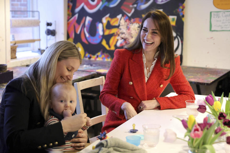 The Duchess of Cambridge speaks to parents who&#39;ve benefited from the programme during a visit to the Copenhagen Infant Mental Health Project in Denmark (Associated Press)