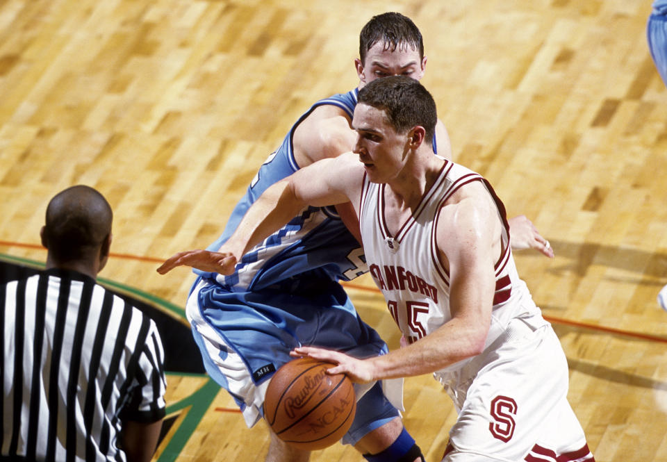 Mar 19, 2000; Birmingham, AL, USA; FILE PHOTO; Stanford Cardinals forward Mark Madsen (45) in action against North Carolina Tar Heels forward Kris Lang (42) during the second round of the NCAA tournament at the Birmingham-Jefferson Civic Center RVR Photos-USA TODAY Sports