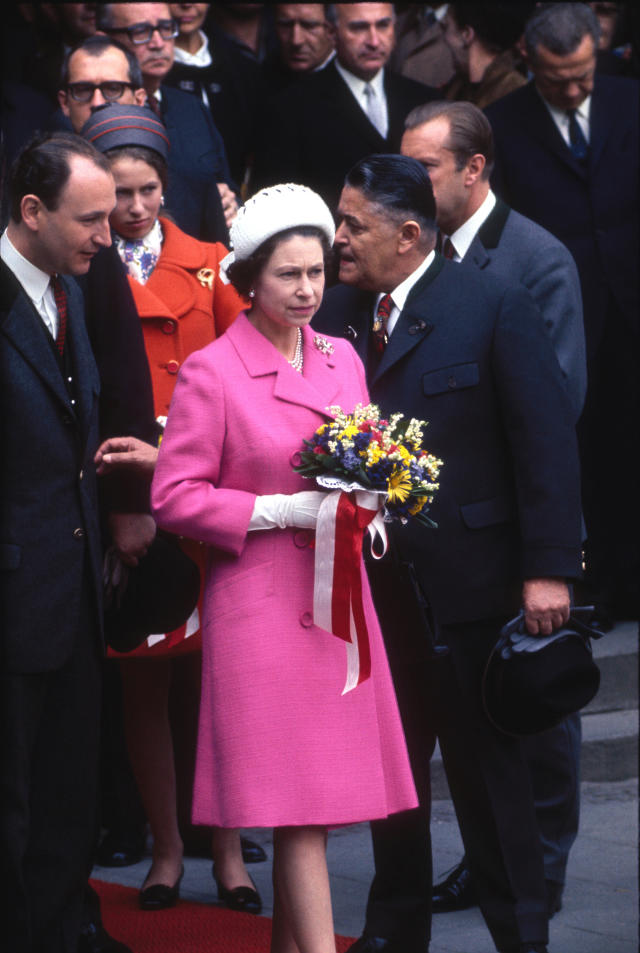 Queen Elizabeth in a pink coat dress