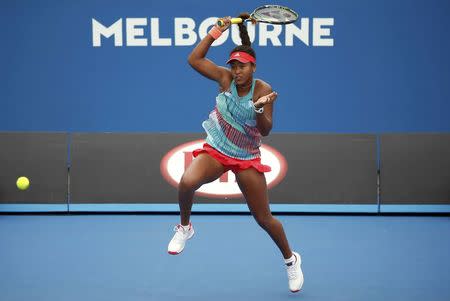 Japan's Naomi Osaka hits a shot during her second round match against Ukraine's Elina Svitolina at the Australian Open tennis tournament at Melbourne Park, Australia, January 21, 2016. REUTERS/Issei Kato