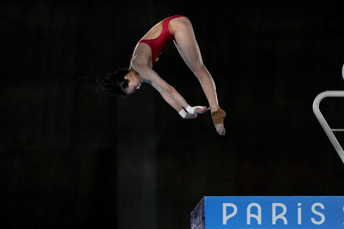 Quan Hongchan of China wins gold on 10meter platform with Chen Yuxi