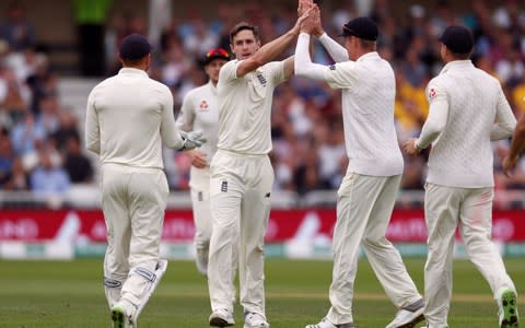 Woakes celebrates taking his second wicket - Credit: Reuters