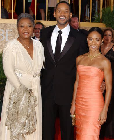 <p>AFF / Alamy</p> Will Smith with his mother Caroline Bright and his wife Jada Pinkett Smith at the 64th Golden Globe Awards in January 2007.