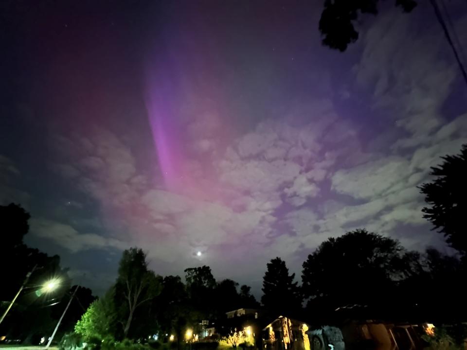 Corrie Carswell of Wyoming, Ohio, captured these images of the Aurora Borealis or northern lights at around 10 p.m. Friday, May 10, with her iPhone camera. She said she was surprised she was able to see the display, as her neighborhood has streetlights and tall trees.