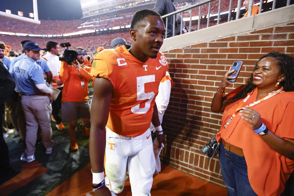 Tennessee quarterback Hendon Hooker (5) leaves the field after his team defeated Alabama 52-49 Saturday, Oct. 15, 2022, in Knoxville, Tenn. (AP Photo/Wade Payne)