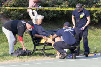 <p>A man receives medical attention from first responders on the scene following a shooting in Alexandria, Va, June 14, 2017. (Photo: Shawn Thew/EPA) </p>