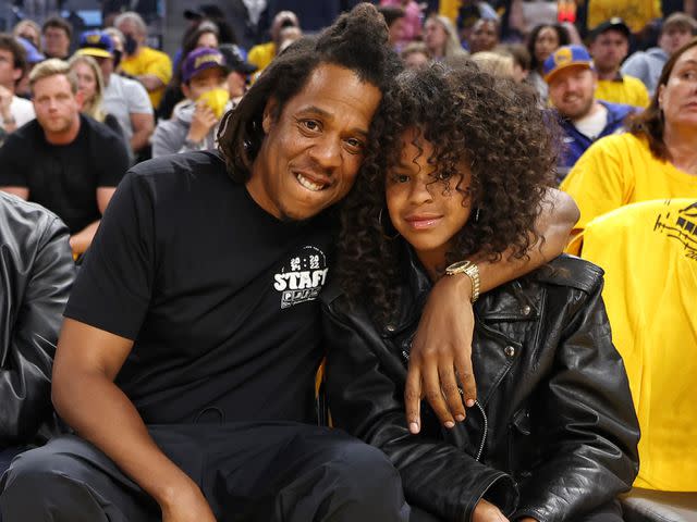 <p>Jim Poorten/NBAE/Getty</p> Jay-Z and his daughter Blue Ivy Carter poses for a photo in the game of the Boston Celtics against the Golden State Warriors during Game Five of the 2022 NBA Finals on June 13, 2022