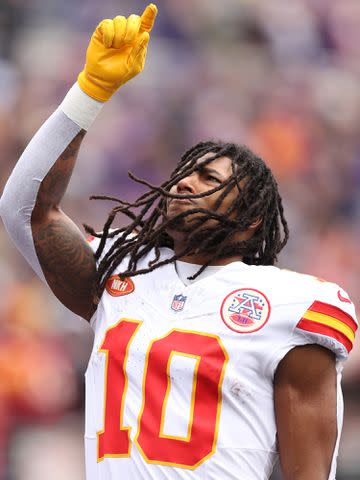 <p>Patrick Smith/Getty </p> Isiah Pacheco #10 of the Kansas City Chiefs takes the field prior to in the AFC Championship Game against the Baltimore Ravens on January 28, 2024 in Baltimore, Maryland.