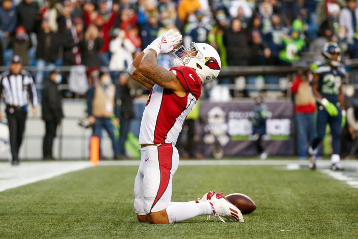 Nov 21, 2021; Seattle, Washington, USA; Arizona Cardinals running back James Conner (6) celebrates after rushing for a touchdown against the Seattle Seahawks during the fourth quarter at Lumen Field. Mandatory Credit: Joe Nicholson-USA TODAY Sports