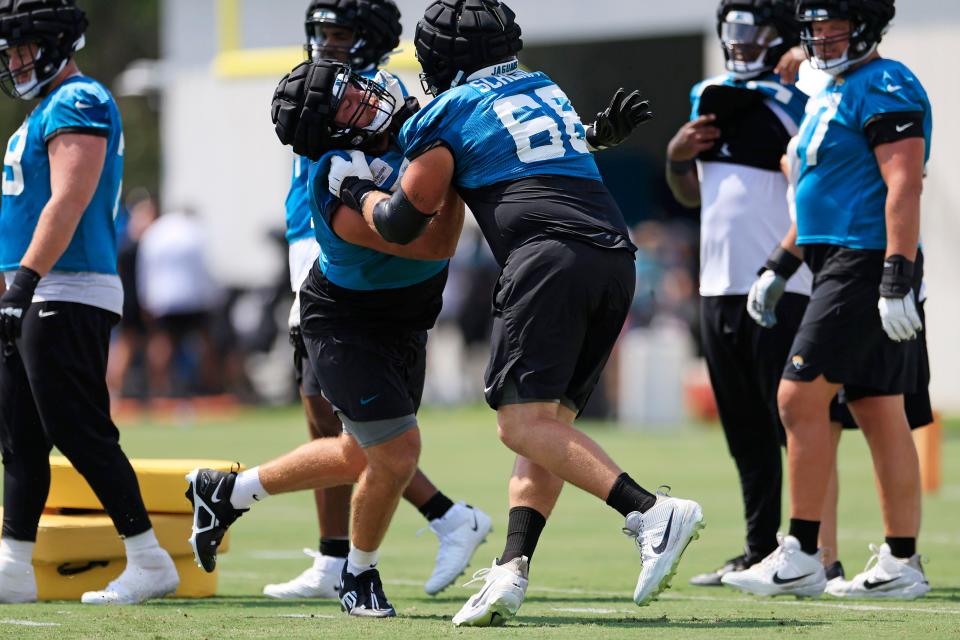 Jacksonville Jaguars guard Brandon Scherff (68) pressures guard Cooper Hodges (75) Monday, Aug. 14, 2023 at Miller Electric Center at EverBank Stadium in Jacksonville, Fla. Today was the 14th training camp session. 