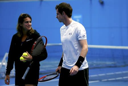 Britain's Andy Murray talks with his coach Amelie Mauresmo during a practice session at the Australian Open tennis tournament at Melbourne Park, Australia, January 22, 2016. REUTERS/Jason O'Brien