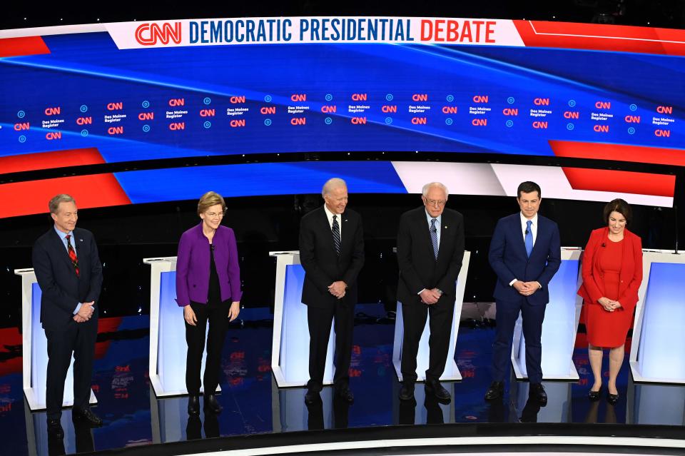 Democratic presidential hopefuls billionaire-philanthropist Tom Steyer, Massachusetts Sen. Elizabeth Warren, Former Vice President Joe Biden, Vermont Sen.or Bernie Sanders, Mayor of South Bend, Indiana, Pete Buttigieg and Minnesota Sen. Amy Klobuchar speak during the seventh Democratic primary debate of the 2020 presidential campaign season co-hosted by CNN and the Des Moines Register at the Drake University campus in Des Moines, Iowa on Jan. 14, 2020.