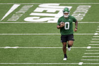 New York Jets' Braelon Allen works out during an NFL rookie minicamp football practice Friday, May 3, 2024, in Florham Park, N.J. (AP Photo/Adam Hunger)