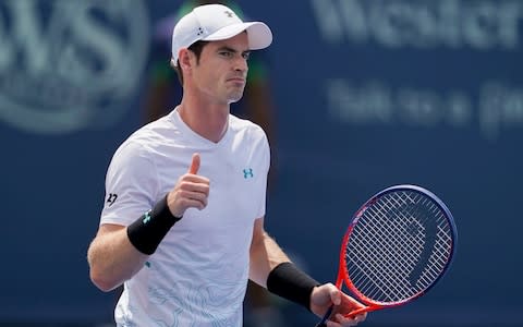 Andy Murray, of Great Britain, reacts during a match against Lucas Pouille, of France, in the first round at the Western & Southern Open, Monday, Aug. 13, 2018, in Mason, Ohio - Credit: AP