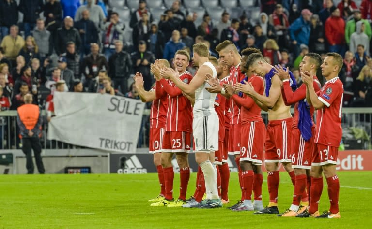 Bayern Munich's players celebrate winning their UEFA Champions League Group B match against Anderlecht, in Munich, on September 12, 2017