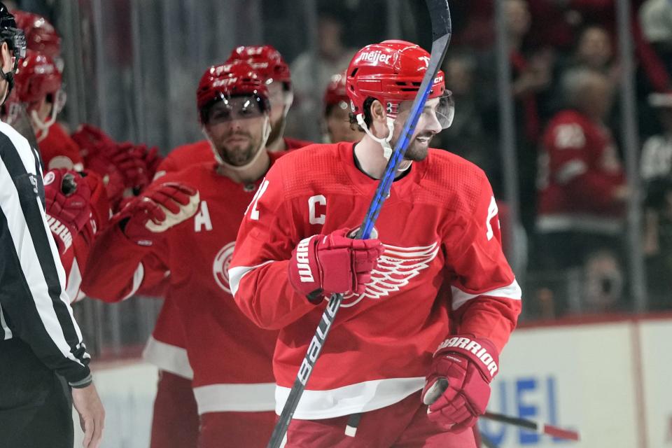 Red Wings center Dylan Larkin smiles after scoring during the second period against the Lightning on Wednesday, Dec. 21, 2022, at Little Caesars Arena.