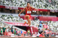 <p>Yaoqing Fang of Team China competes in the Men's Triple Jump Qualification on day eleven of the Tokyo 2020 Olympic Games at Olympic Stadium on August 03, 2021 in Tokyo, Japan. (Photo by Matthias Hangst/Getty Images)</p> 