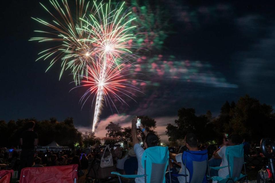 Fireworks illuminate the skyline over Hagan Park in Rancho Cordova on Wednesday during the city’s Fourth of July celebration.