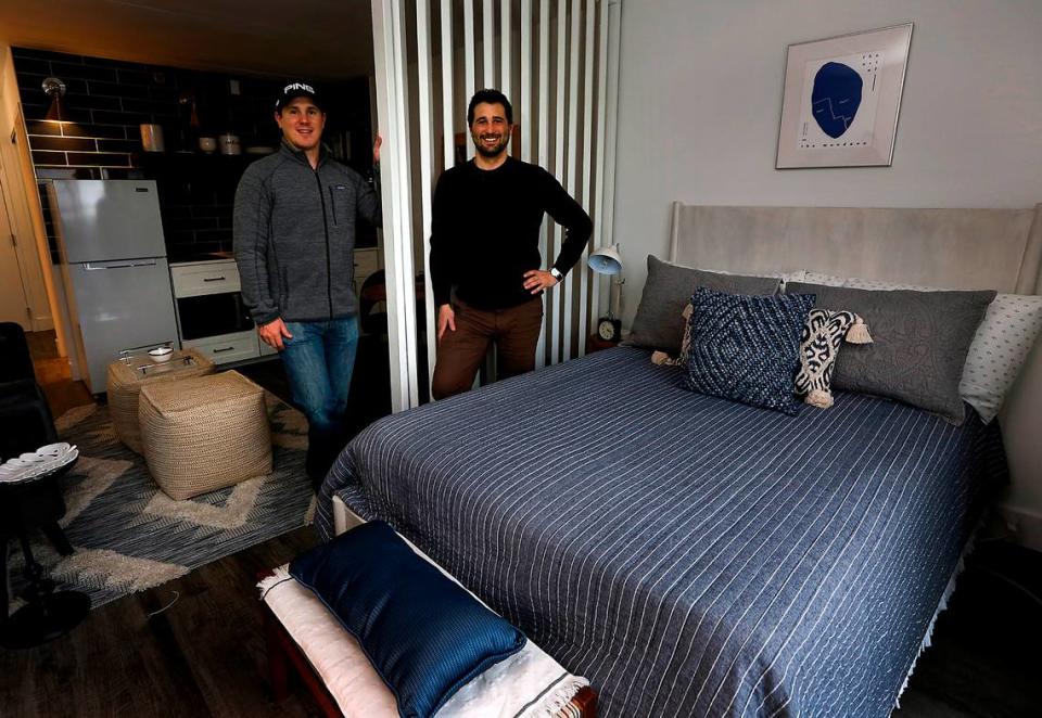 Fortify Holdings co-regional managers Rob Jacobs, left, and his brother, Daniel, stand in a finished model micro apartment inside The Franklin complex in Richland.