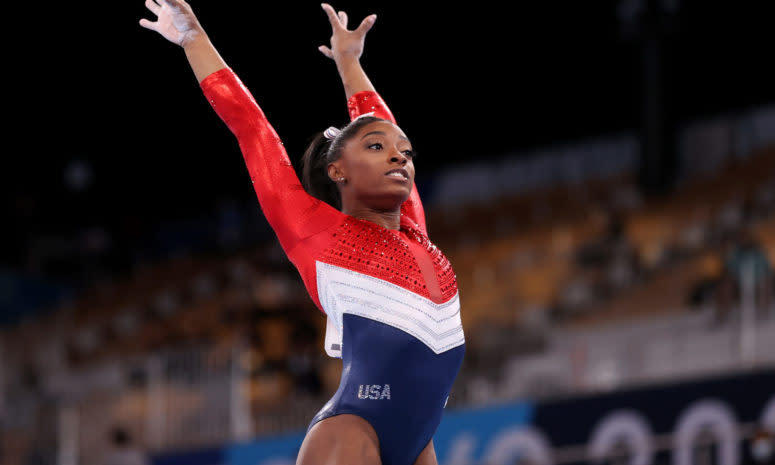 Simone Biles competing at the Tokyo Olympics.