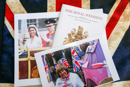 FILE PHOTO: Photos and royal family memorabilia collected by royal superfan Donna Werner while traveling to England for the weddings of Prince Andrew, Prince William and Queen Elizabeth's 90th birthday celebration, are seen at her home in New Fairfield, Connecticut, U.S. March 20, 2018. REUTERS/Michelle McLoughlin