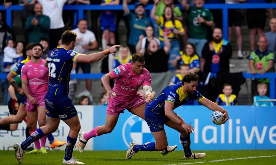<span>Warrington’s Toby King scores his side's third try during their 20-8 victory over Hull KR.</span><span>Photograph: Nick Potts/PA</span>