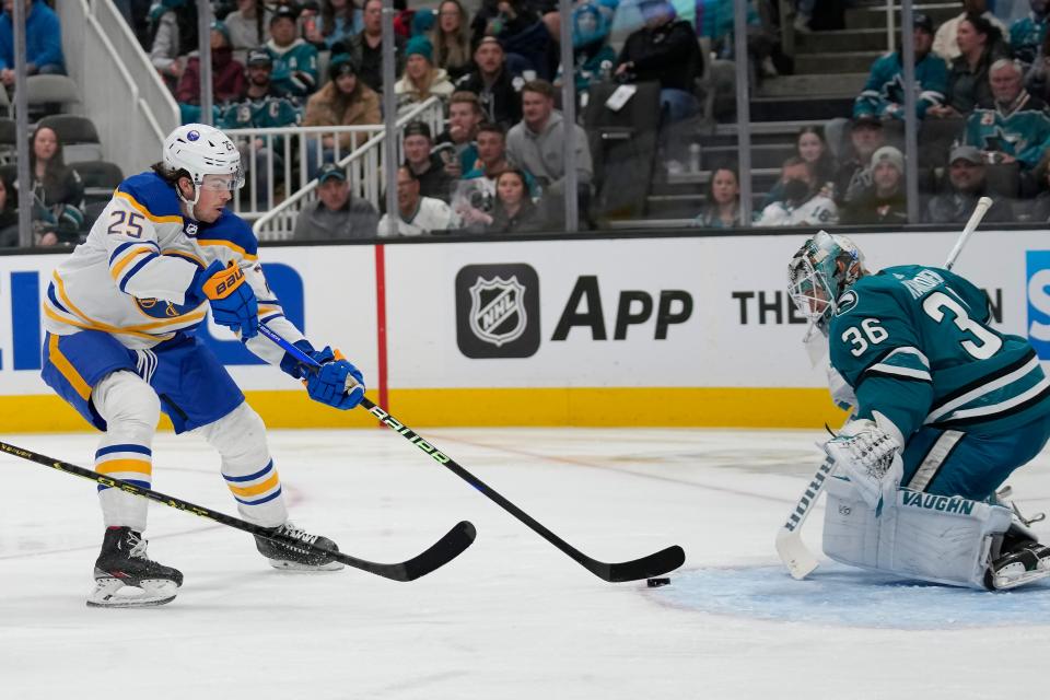 Buffalo Sabres defenseman Owen Power (25) scores a goal against the San Jose Sharks in February.