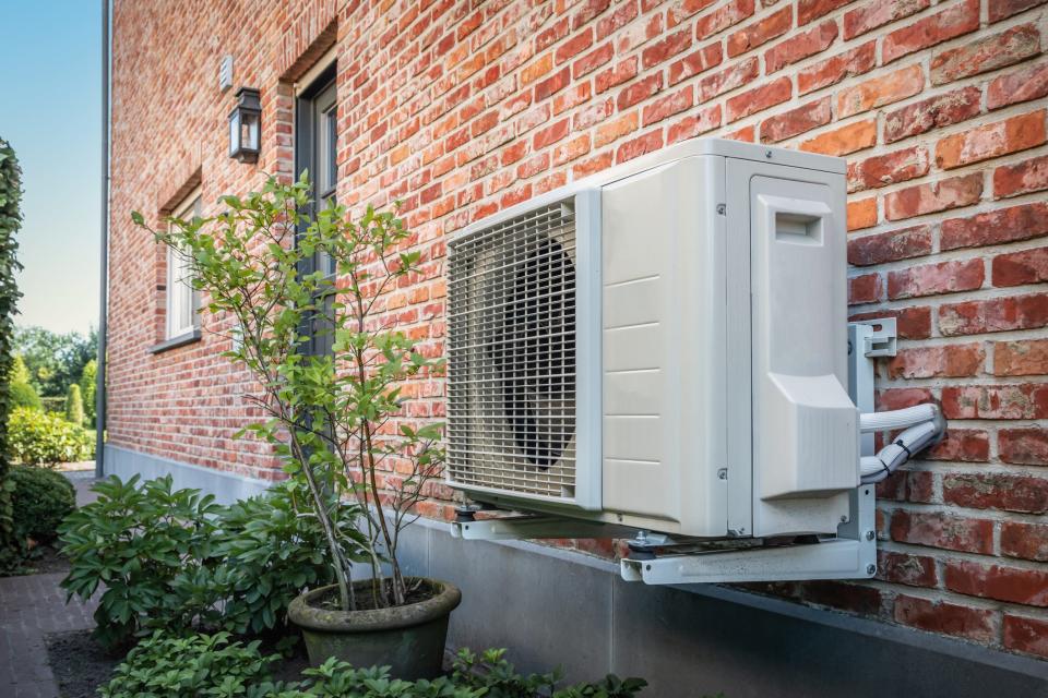 An example of an outdoor heat pump unit. This type of energy system can use less electricity for cooling than traditional air conditioners. Homeowners in New York may qualify for rebates if they've made energy efficient upgrades, like a heat pump installation.