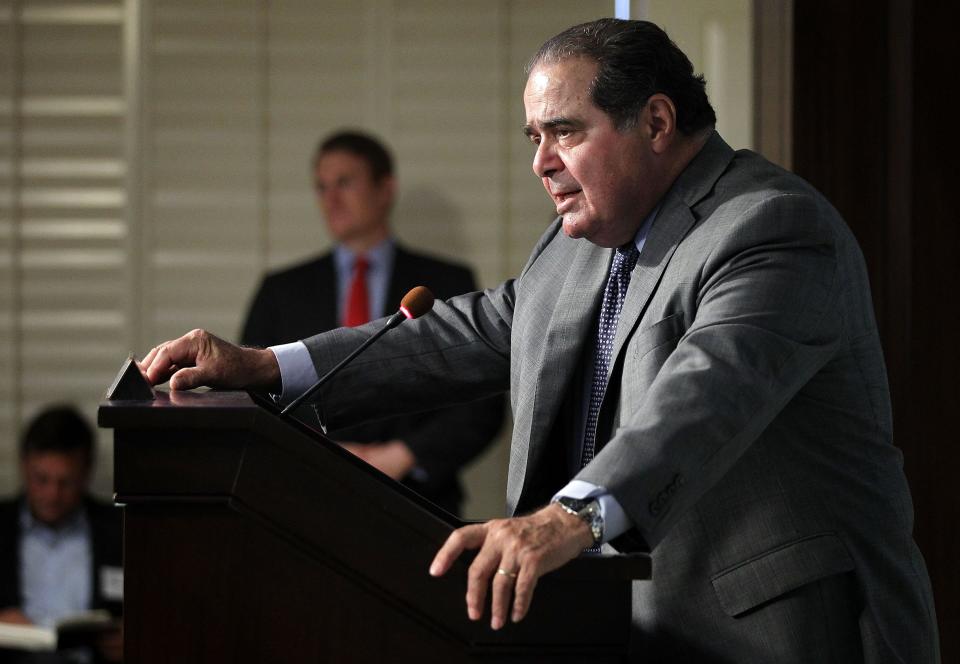 U.S. Supreme Court Justice Antonin Scalia speaks at the American Enterprise Institute in Washington in 2012. AEI and the Federalist Society held a book discussion with Scalia, who coauthored "Reading Law: The Interpretation of Legal Texts." Scalia served on the Supreme Court until his death in February 2016.