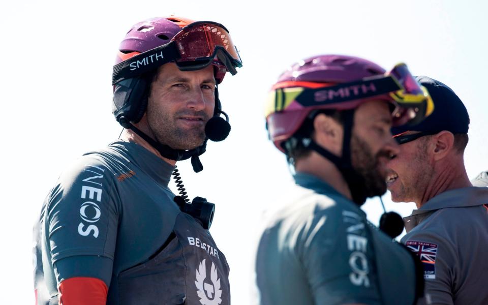 Skipper of INEOS Team UK Ben Ainslie (L) smiles after defeating Luna Rossa Prada Pirelli Team in round one, race 2 during the 2021 Prada Cup of the America's Cup challenger series in Auckland on January 15, 2021 - AFP/GILLES MARTIN-RAGET 