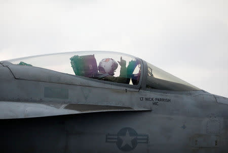 A U.S. F18 fighter jet prepares for take off from the deck of U.S. aircraft carrier USS Carl Vinson during an annual joint military exercise called "Foal Eagle" between South Korea and U.S., in the East Sea, South Korea, March 14, 2017. REUTERS/Kim Hong-Ji