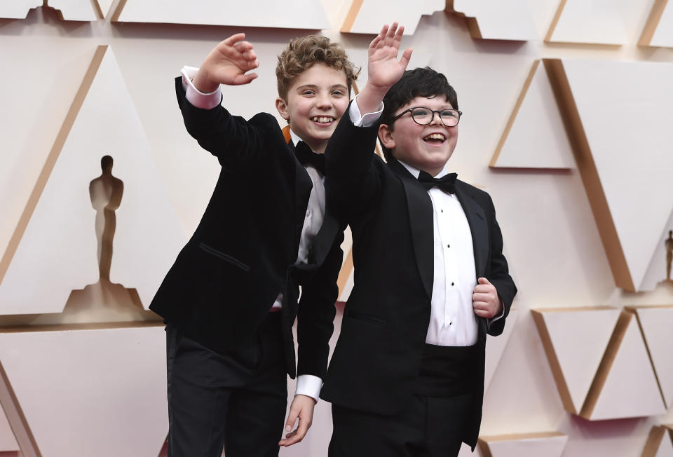 Roman Griffin Davis, left, and Archie Yates arrive at the Oscars on Sunday, Feb. 9, 2020, at the Dolby Theatre in Los Angeles. (Photo by Jordan Strauss/Invision/AP)