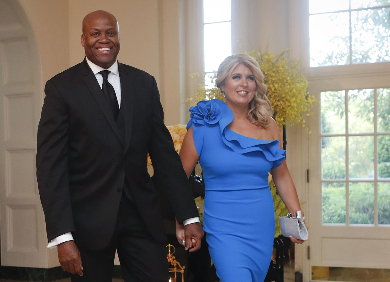 Craig Robinson, brother of former first lady Michelle Obama, and his wife, Kelly Robinson. (AP)