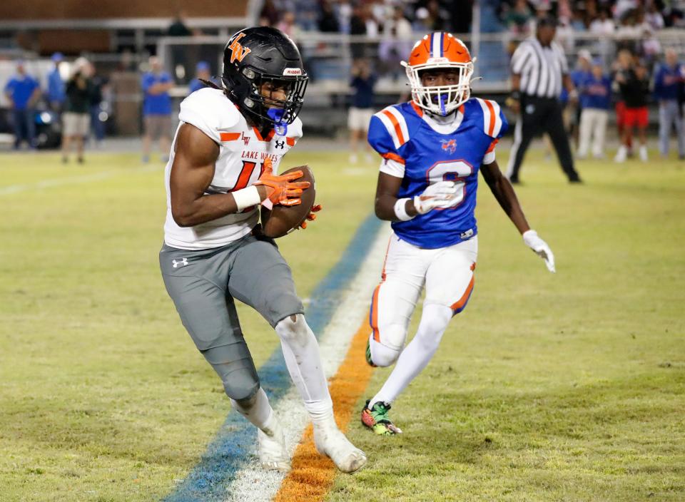 Lake Wales' Messiah Marlow makes a reception in the first half against Bartow on Friday night at Bartow Memorial Stadium.