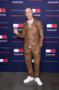 Alan Cumming arrives at the Tommy Hilfiger show. (Getty Images)