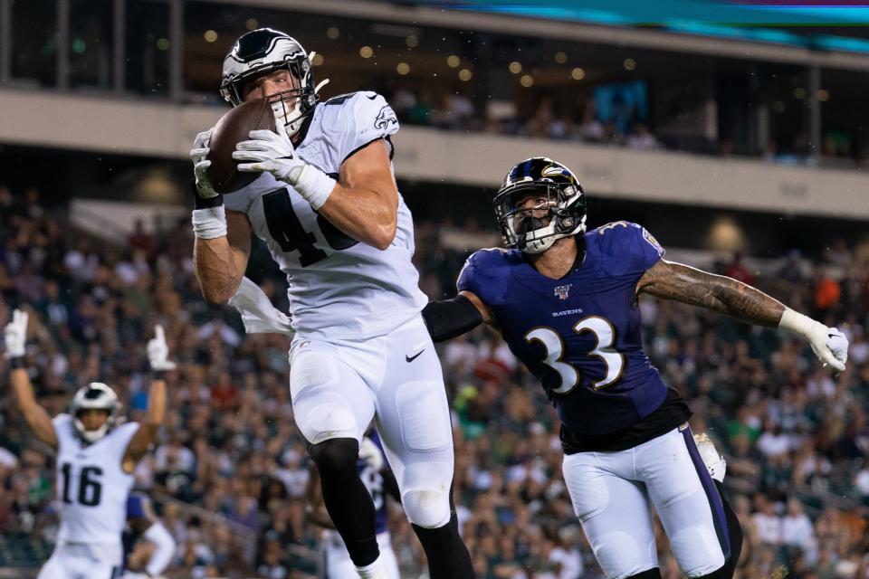 Aug 22, 2019; Philadelphia, PA, USA; Philadelphia Eagles tight end Alex Ellis (48) catches a touchdown pass against Baltimore Ravens defensive back Bennett Jackson (33) during the third quarter at Lincoln Financial Field. Mandatory Credit: Bill Streicher-USA TODAY Sports