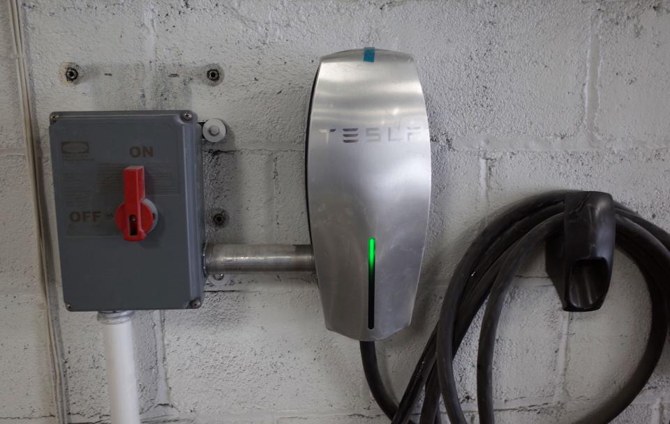 Tesla battery charger garage