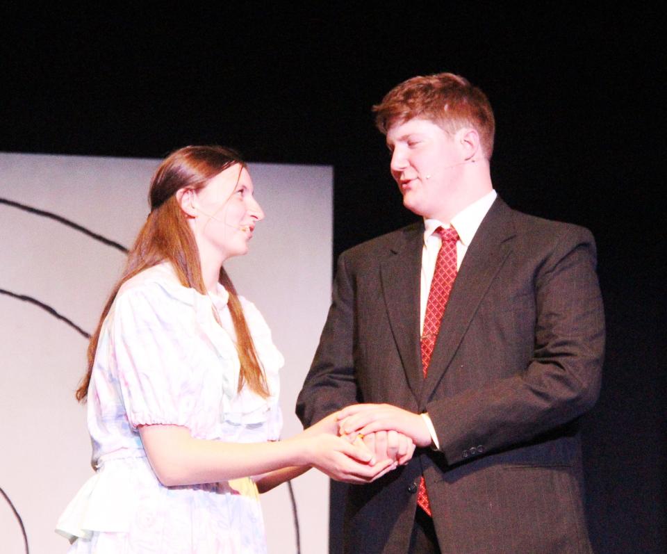 Winifred (Rosie Krenz) and George Banks (Abram Cutrell) talk about the future of the bank where George works during the Vermillion Players' children's theater production of "Mary Poppins, Jr."