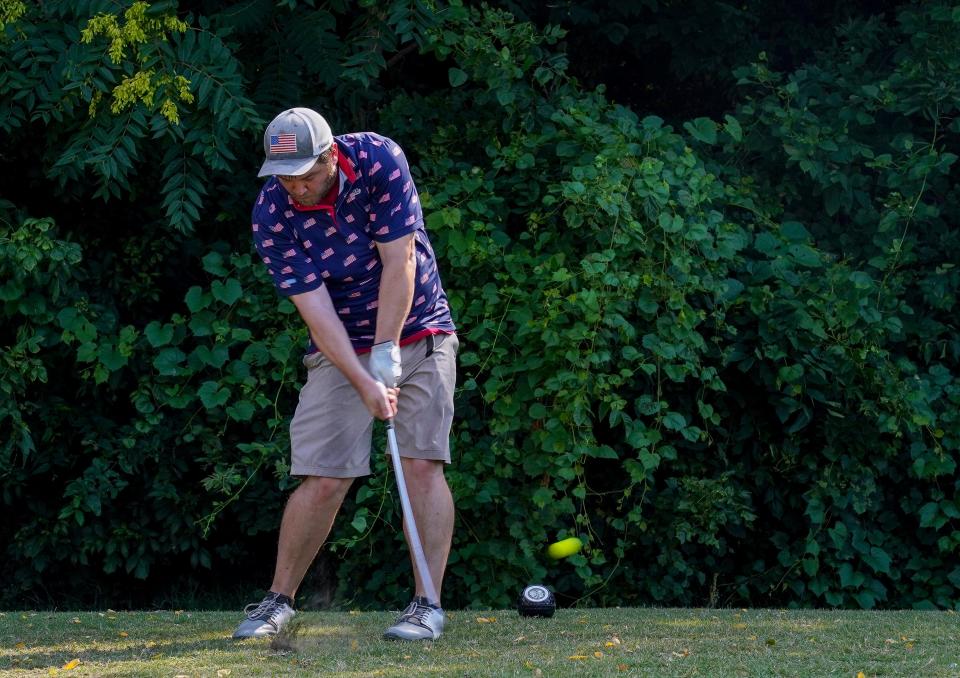 Clark Carnahan tees off on the 10th hole during the Evansville Men's City Golf Tournament qualifying round at Helfrich Hills Golf Course in Evansville, Ind., Saturday morning, July 2, 2022. 