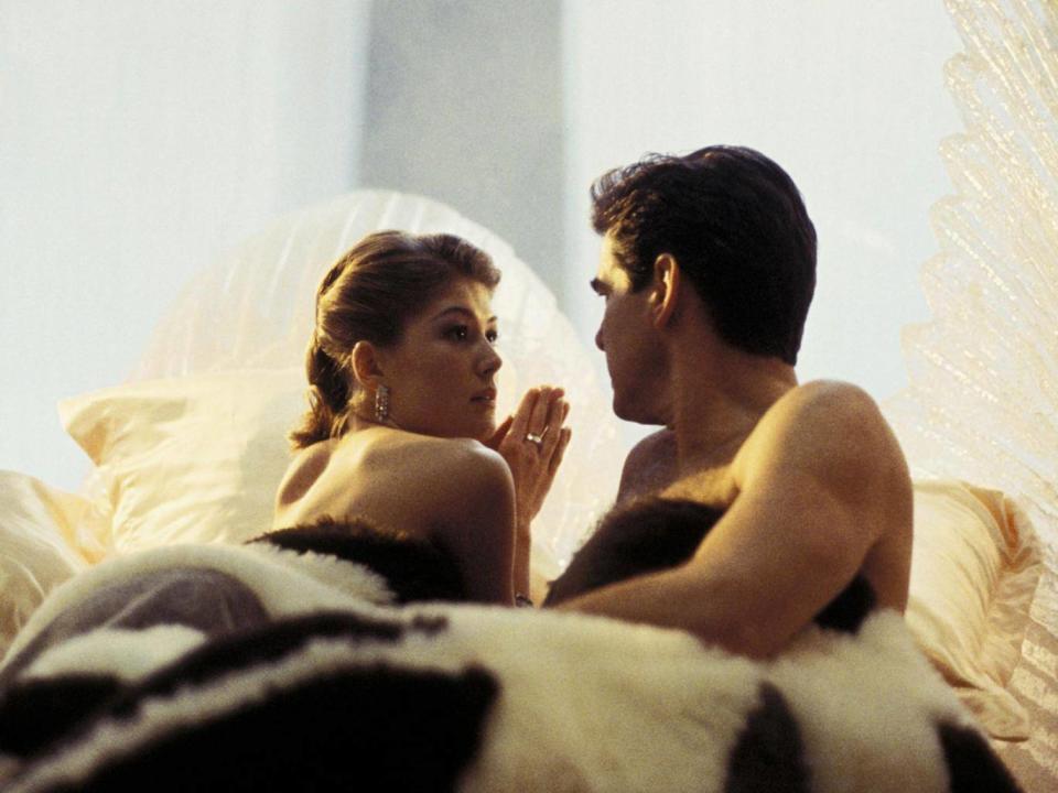 Pike as Bond Girl, Miranda Frost and Pierce Brosnan as James Bond in 'Die Another Day' (Rex)
