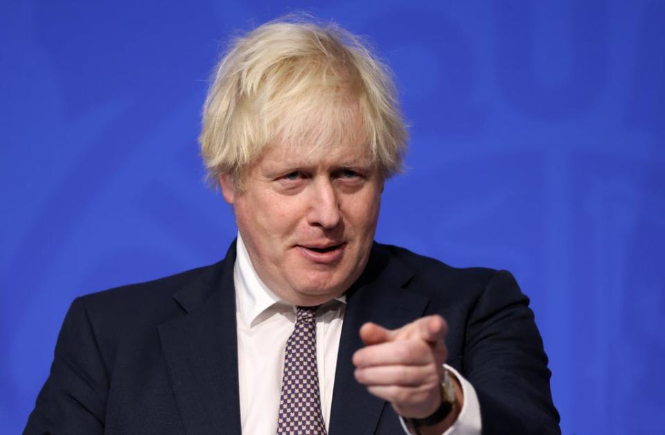 Prime Minister Boris Johnson said the military would help the NHS deliver booster jabs (Hollie Adams/PA) (PA Wire)