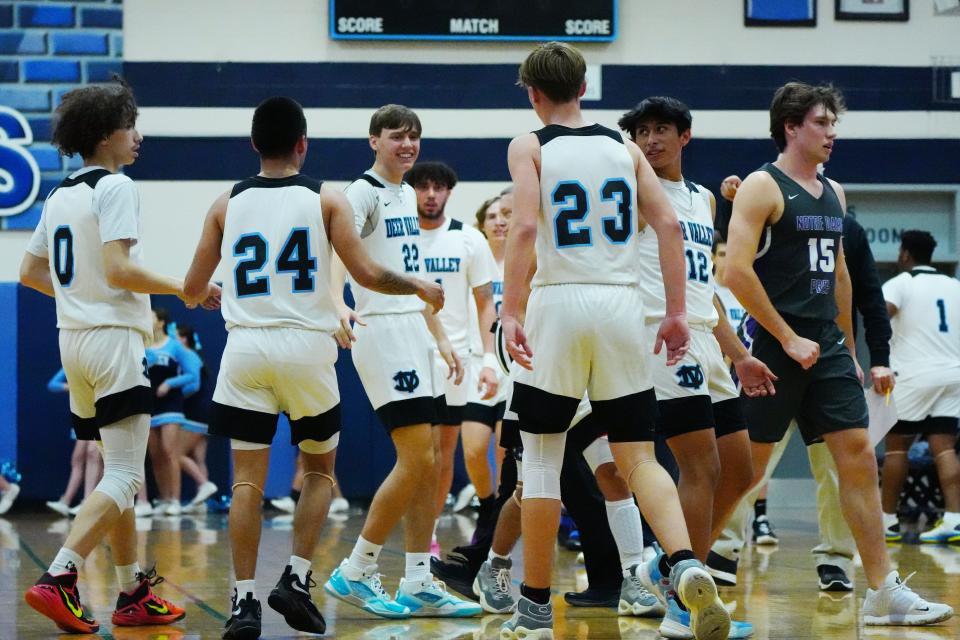 Jan 13, 2022; Glendale, AZ, United States; Deer Valley celebrates a buzzer beater shot in the first quarter against Notre Dame Prep during a game at Deer Valley High School. Mandatory Credit: Patrick Breen- The Republic