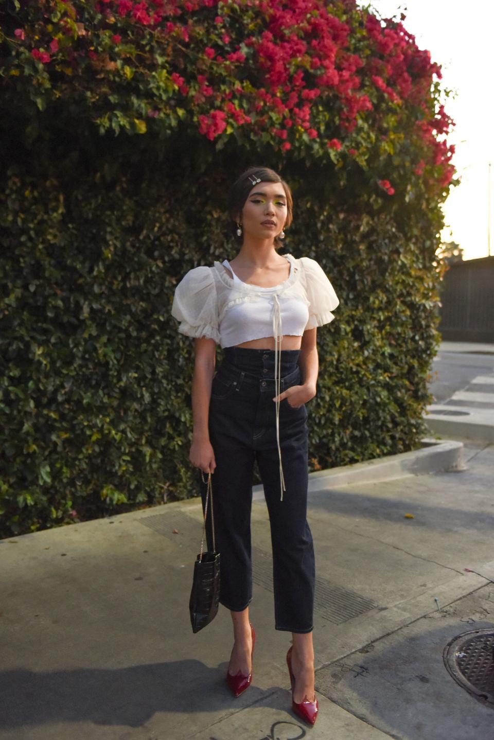 Rowan Blanchard with a TL-180 bag and Givenchy earrings