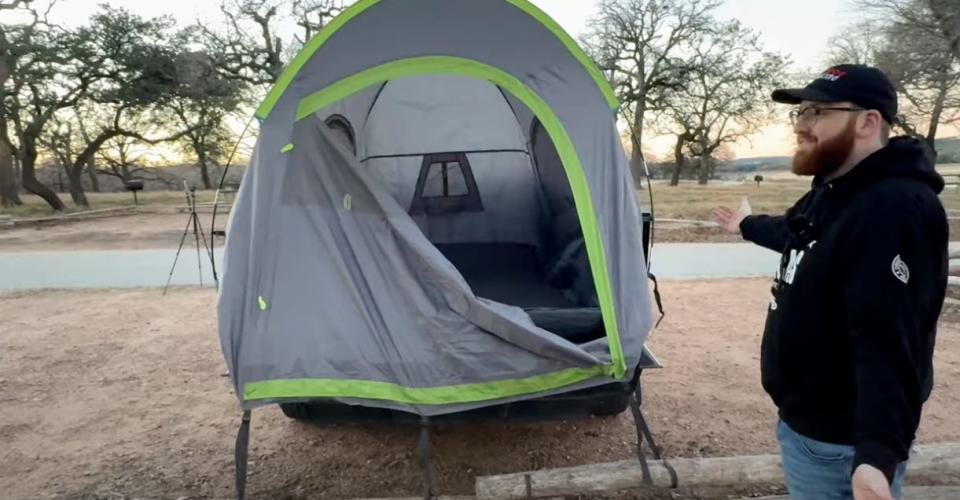 Cybertruck owner bought a truck tent to go camping.